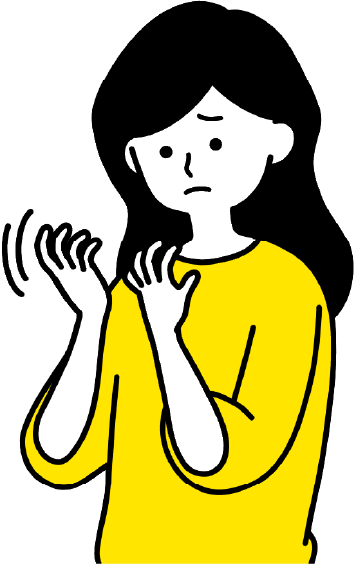 手に違和感を感じている女性